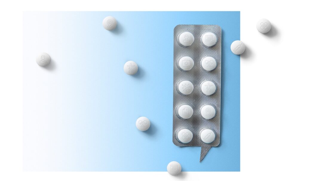 Top view on the pills in the package. White pills on blue background. Medicine, medication, painkillers, tablet, medicaments, drugs, antibiotic, vitamin, treatment, capsule, dose. Pharmacy theme.