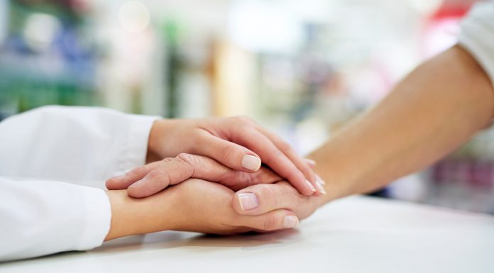 The role of pharmacists in new euthanasia laws pharmacist holding patient hand