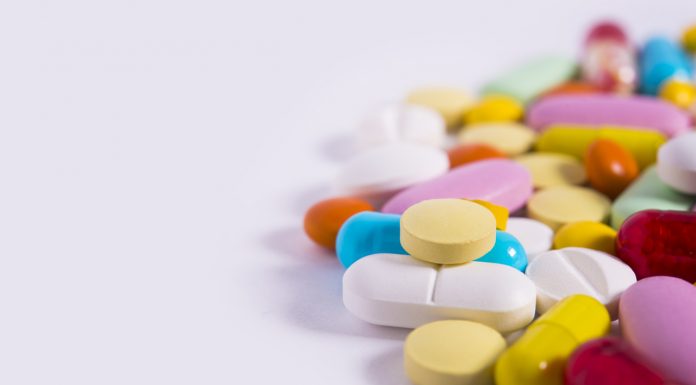 Medication management in older Australians pile of pills with different shapes and colours
