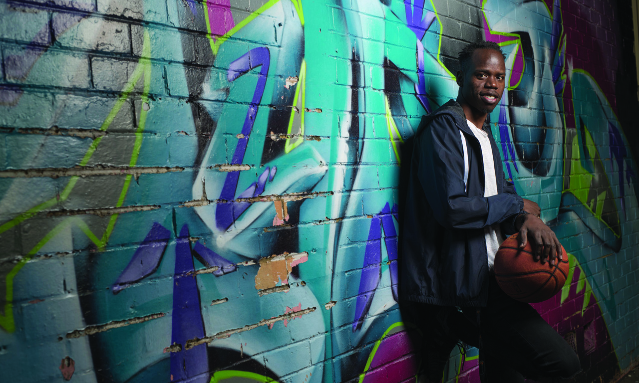yongdeng_WEB Yong Deng holding basketball