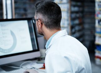 NT pharmacists leading the way in My Health Record uptake pharmacist using a computer