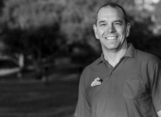 Big Visions: from pharmacy to charity work black and white portrait of simon carroll