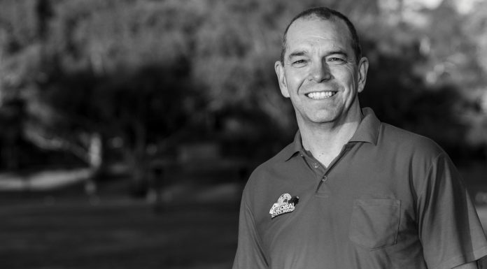 Big Visions: from pharmacy to charity work black and white portrait of simon carroll