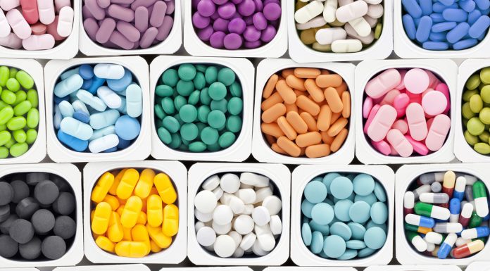 Australians’ understanding of their medicines falls short colourful medications sorted into cups