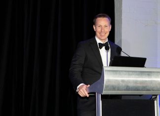 The pharmacy service improving men’s health down under Brad Butt MPS accepting his award