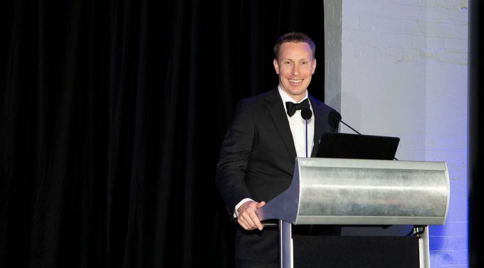 The pharmacy service improving men’s health down under Brad Butt MPS accepting his award