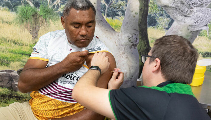 Deadly-Choices-Ambassador-Steve-Renouf-recieve-his-vaccination-from-pharmacist-Matthew-Hoy-feature Deadly Choices Ambassador Petero Civoniceva receives his vaccine from pharmacist Matthew Hoy MPS