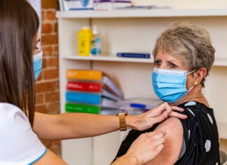 Pharmacists begin delivering flu vaccine