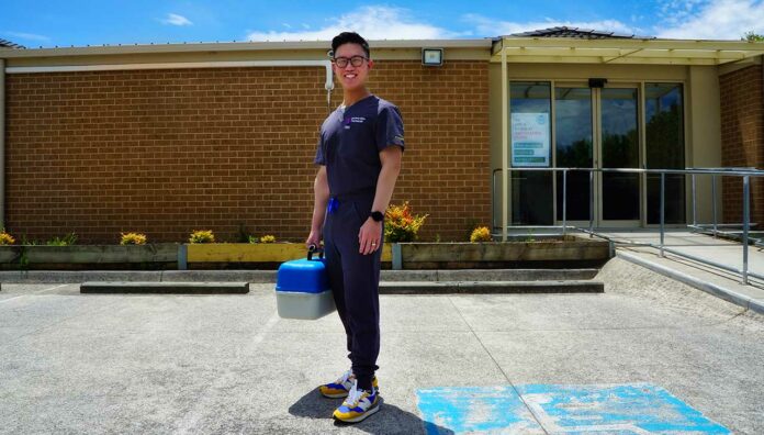 Zachary Sum delivering medicines