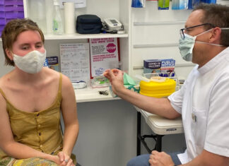 Queensland pharmacists scramble to get ready for free flu vaccines