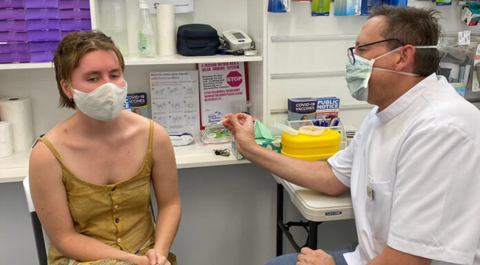 Queensland pharmacists scramble to get ready for free flu vaccines
