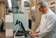 Document, document, document Pharmacist taking notes on a computer