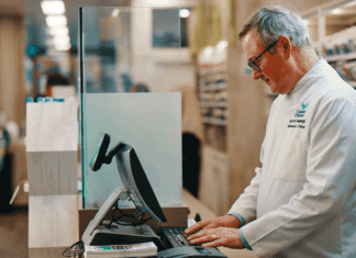 Document, document, document Pharmacist taking notes on a computer